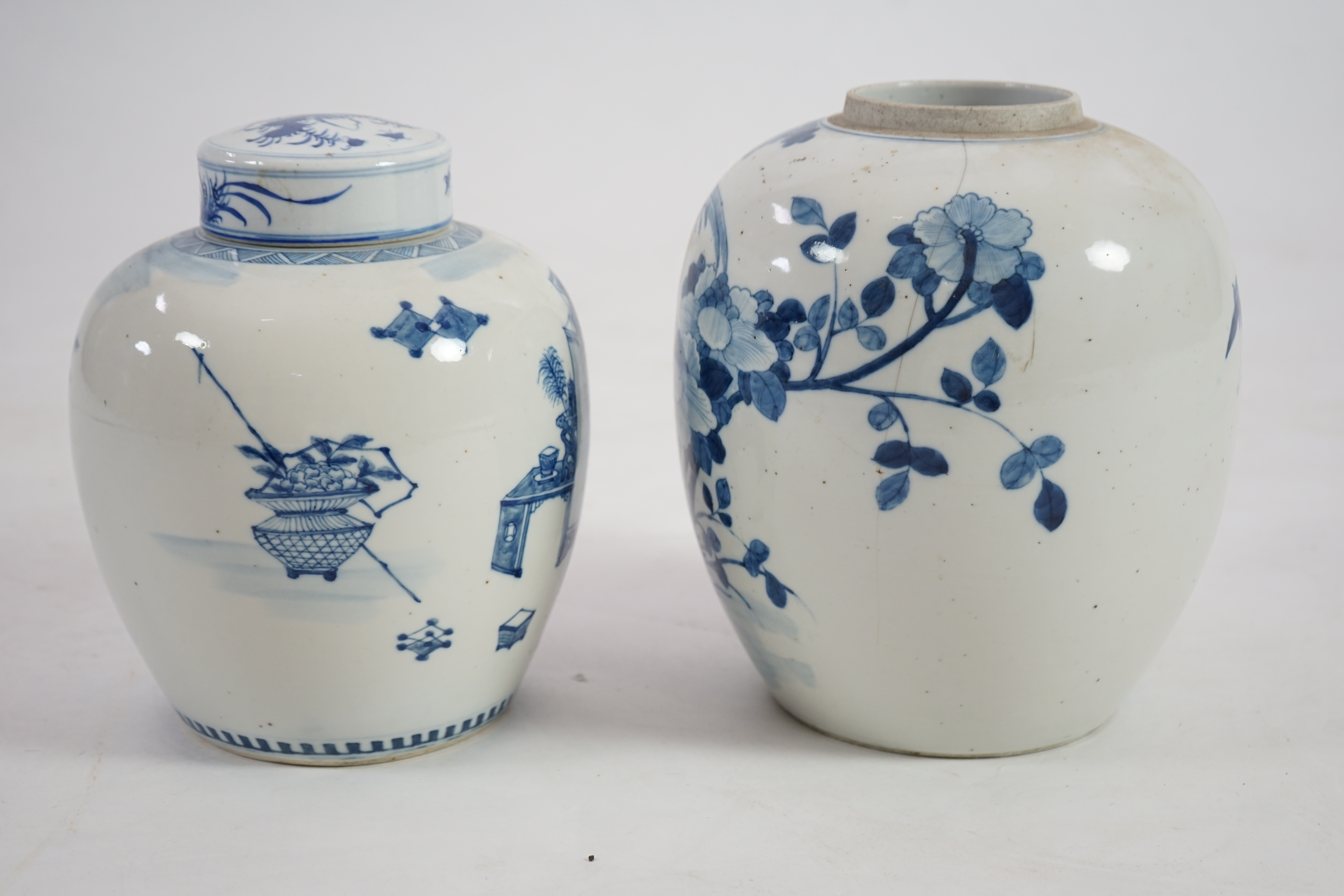 Two Chinese blue and white ovoid jars, one with associated cover, 19th century